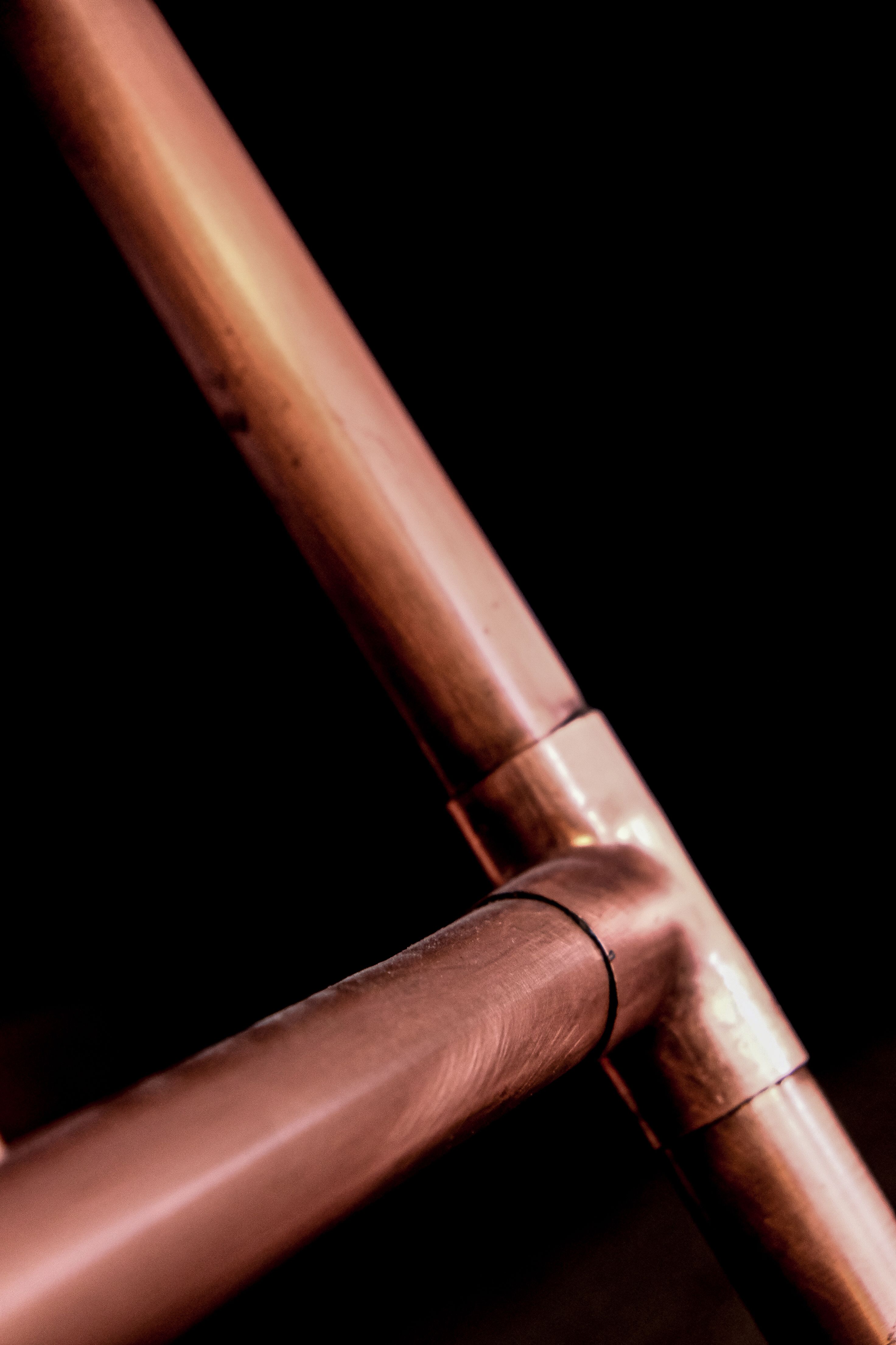 Close-up of copper pipes for pre-insulated HVAC linesets in Calgary